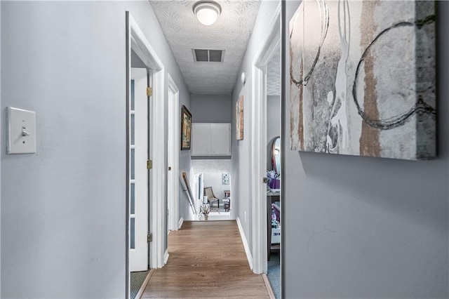 3778 Berdon Ln, Decatur, GA 30034 - hall featuring a textured ceiling and wood finished floors