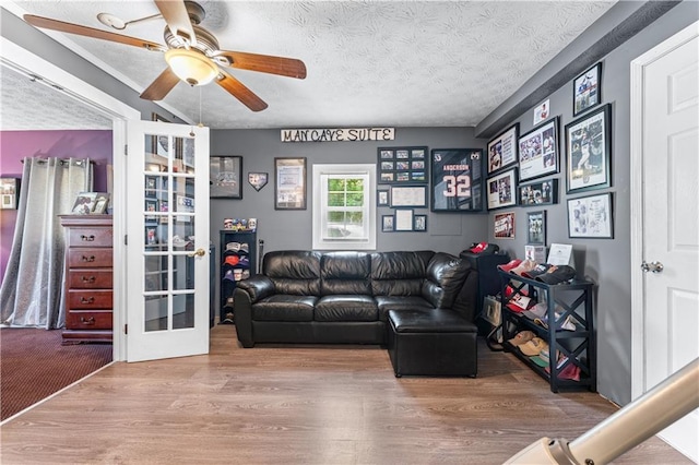 3778 Berdon Ln, Decatur, GA 30034 - living room featuring a ceiling fan, a textured ceiling, and wood finished floors