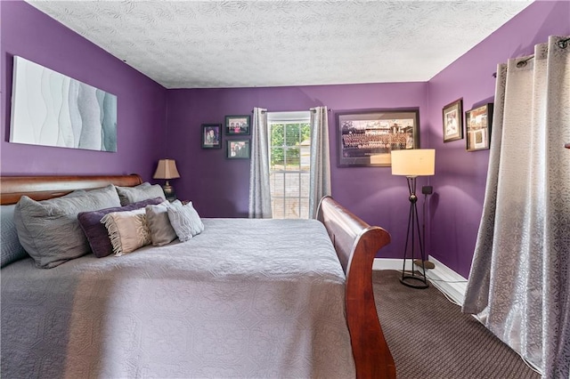 3778 Berdon Ln, Decatur, GA 30034 - carpeted bedroom featuring a textured ceiling and baseboards