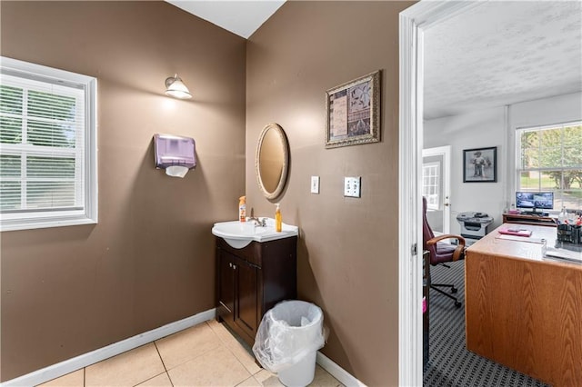 3778 Berdon Ln, Decatur, GA 30034 - bathroom featuring baseboards, vanity, and tile patterned flooring