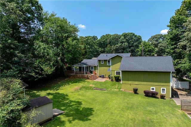 3778 Berdon Ln, Decatur, GA 30034 - view of green lawn with a wooden deck