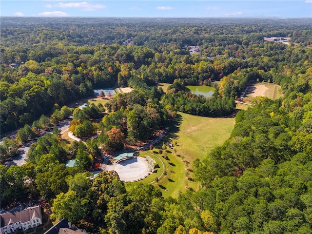 aerial view featuring a forest view