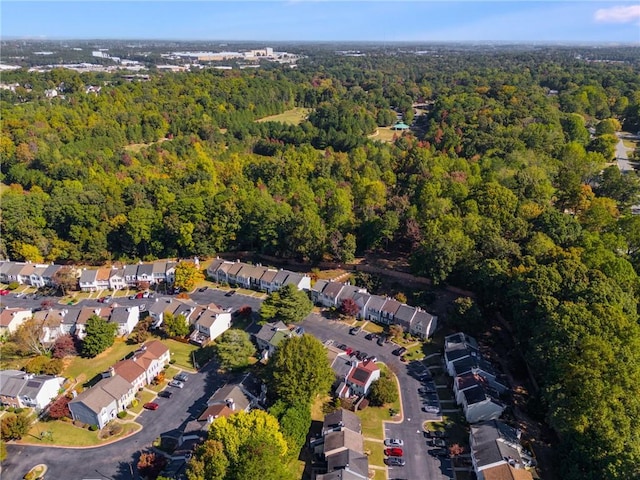 aerial view featuring a residential view and a forest view