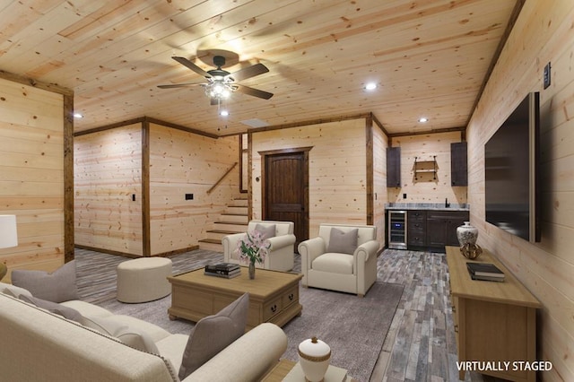 living room with beverage cooler, wooden ceiling, ceiling fan, and hardwood / wood-style floors