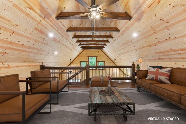 interior space featuring wooden ceiling, lofted ceiling with beams, carpet, and ceiling fan