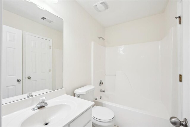 718 Surrey Park Pl SE, Smyrna, GA 30082 - full bathroom featuring shower / bathing tub combination, vanity, and toilet