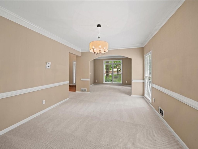 740 Orchard Ct, Atlanta, GA 30328 - carpeted spare room featuring a chandelier, ornamental molding, and arched walkways