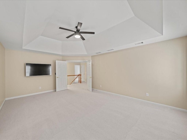 740 Orchard Ct, Atlanta, GA 30328 - empty room with a raised ceiling, ceiling fan, and carpet flooring