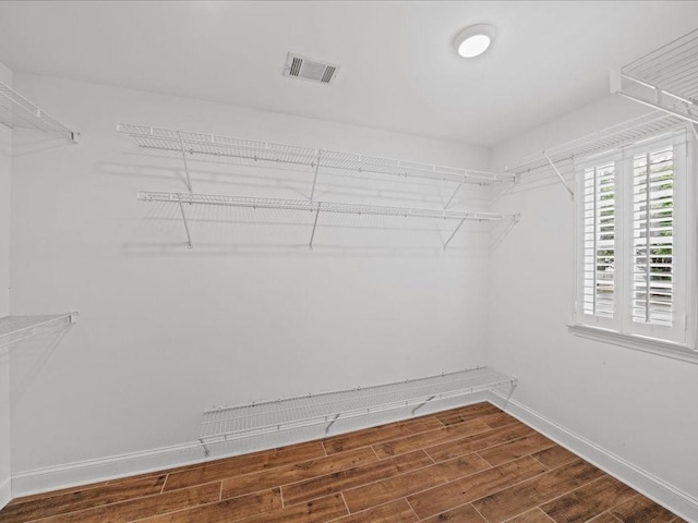 740 Orchard Ct, Atlanta, GA 30328 - spacious closet featuring dark wood-style flooring