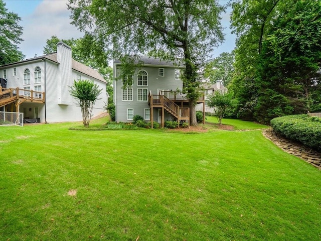 740 Orchard Ct, Atlanta, GA 30328 - rear view of property featuring stairway, a deck, and a yard
