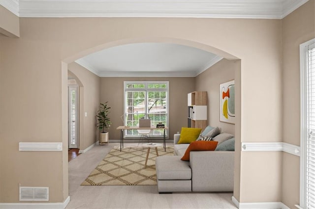 740 Orchard Ct, Atlanta, GA 30328 - carpeted living area featuring arched walkways and ornamental molding