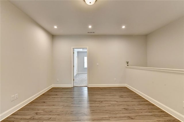 6270 Bracken Brown Dr, Alpharetta, GA 30004 - unfurnished room with wood finished floors and recessed lighting