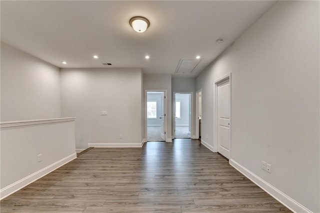 6270 Bracken Brown Dr, Alpharetta, GA 30004 - unfurnished room featuring attic access, recessed lighting, wood finished floors, and a smoke detector