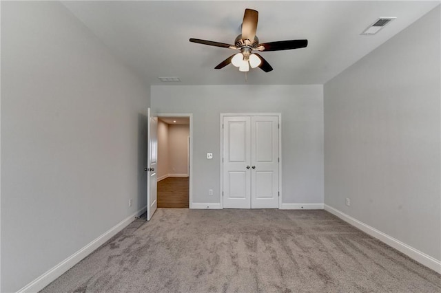 6270 Bracken Brown Dr, Alpharetta, GA 30004 - unfurnished bedroom with carpet flooring, ceiling fan, and a closet