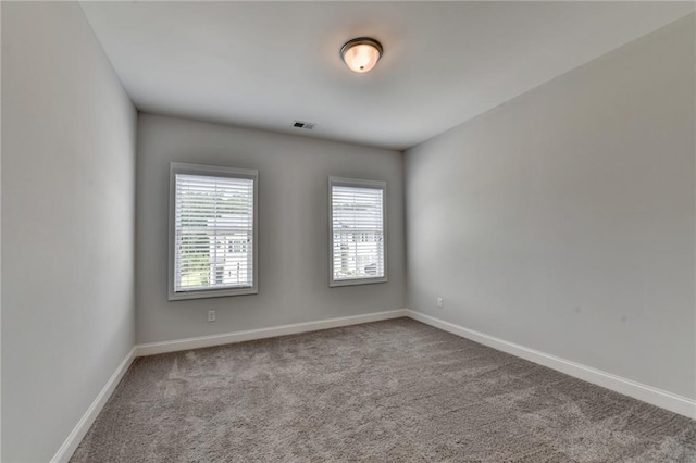 6270 Bracken Brown Dr, Alpharetta, GA 30004 - spare room featuring carpet flooring and baseboards