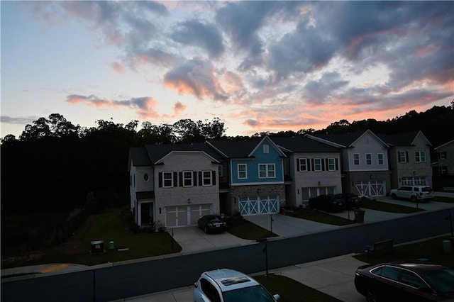 6270 Bracken Brown Dr, Alpharetta, GA 30004 - view of front of home featuring an attached garage, concrete driveway, and a residential view