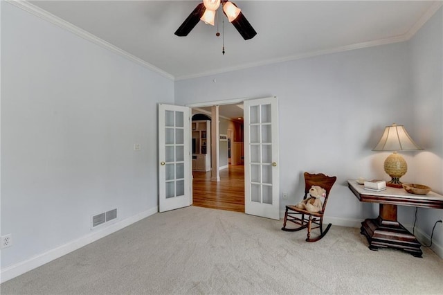 1901 Paper Birch Cv, Grayson, GA 30017 - sitting room featuring french doors, crown molding, carpet floors, a ceiling fan, and baseboards
