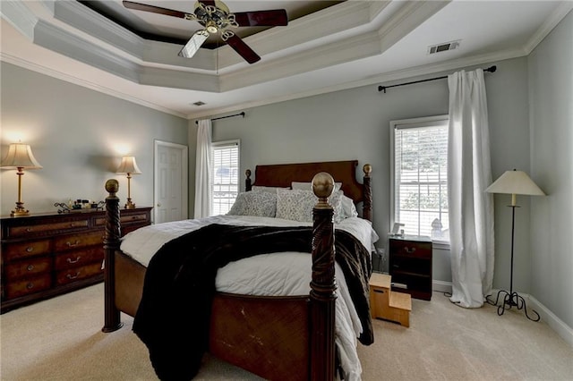 1901 Paper Birch Cv, Grayson, GA 30017 - bedroom with light carpet, crown molding, a raised ceiling, a ceiling fan, and baseboards