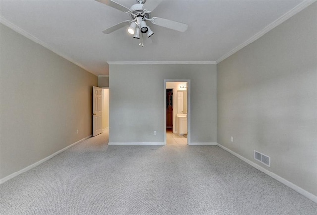 1901 Paper Birch Cv, Grayson, GA 30017 - unfurnished bedroom with crown molding, light carpet, baseboards, ensuite bathroom, and ceiling fan