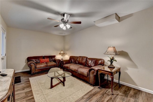 1901 Paper Birch Cv, Grayson, GA 30017 - living room featuring baseboards, ceiling fan, and wood finished floors