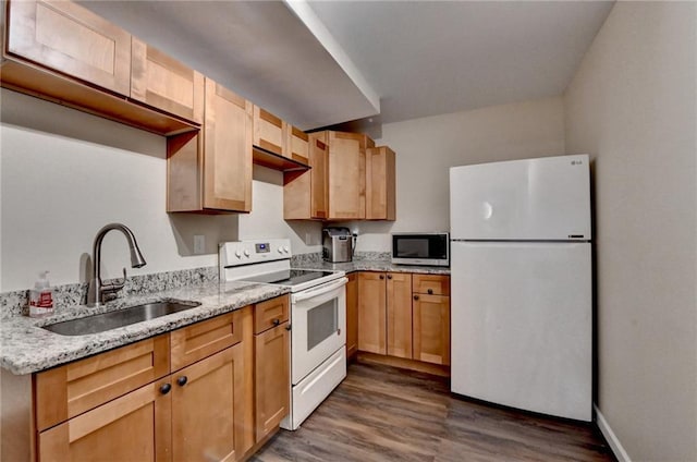 1901 Paper Birch Cv, Grayson, GA 30017 - kitchen featuring white appliances, a sink, dark wood-type flooring, and light stone counters