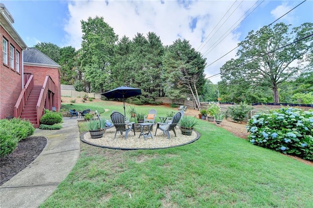 1901 Paper Birch Cv, Grayson, GA 30017 - view of yard featuring a patio area, stairs, and view of scattered trees