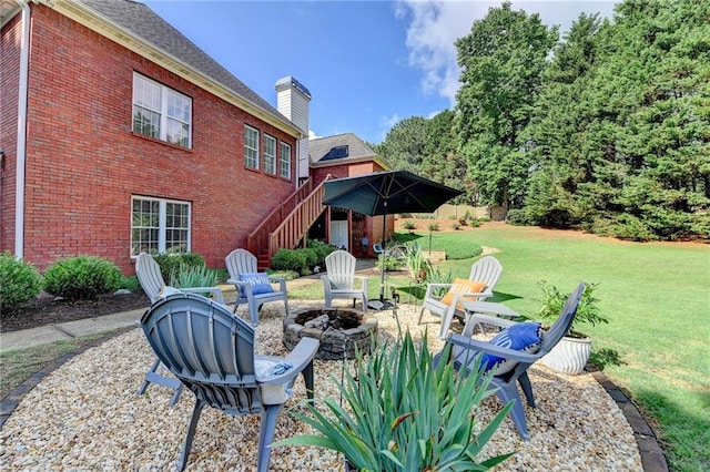 1901 Paper Birch Cv, Grayson, GA 30017 - view of green lawn featuring a fire pit and stairs
