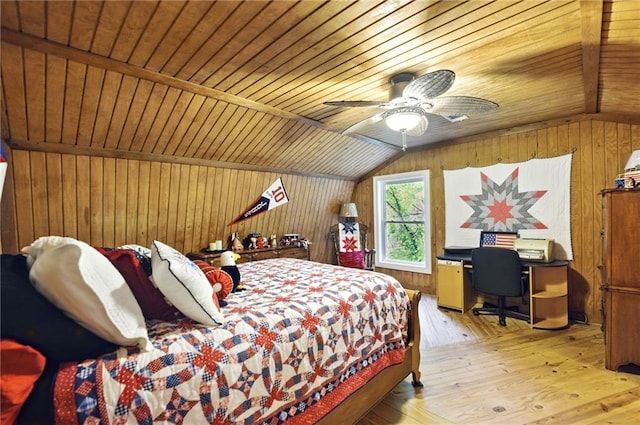 bedroom with wood-type flooring, wood walls, a ceiling fan, wooden ceiling, and lofted ceiling