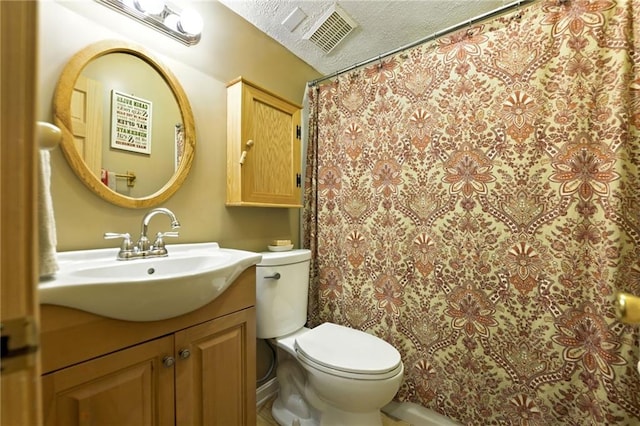 full bathroom with vanity, toilet, a textured ceiling, a shower with curtain, and visible vents