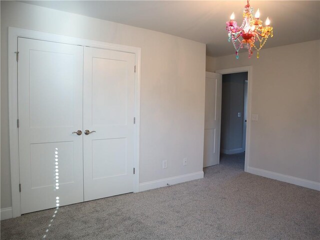 interior space with light carpet, ceiling fan, visible vents, and baseboards