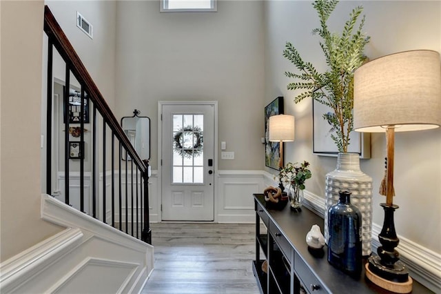 entrance foyer featuring hardwood / wood-style flooring