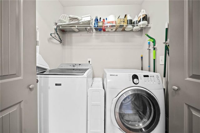 washroom featuring separate washer and dryer