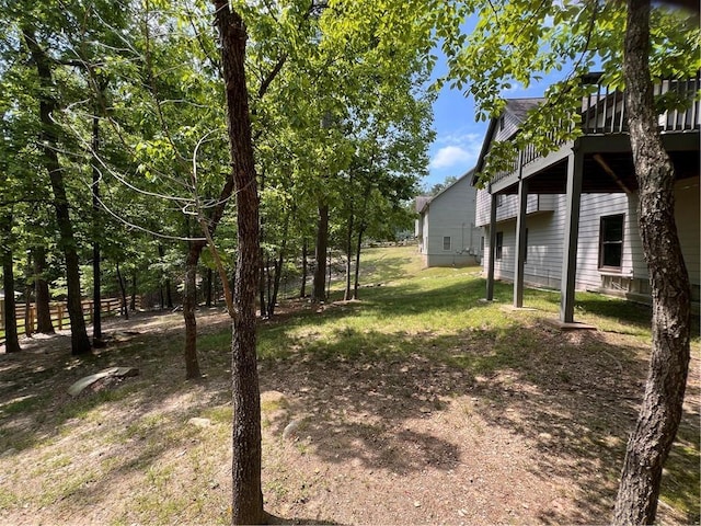view of yard with a wooden deck