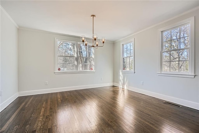 unfurnished dining area with an inviting chandelier, crown molding, and dark hardwood / wood-style floors