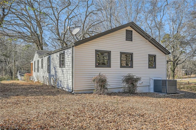 view of property exterior with cooling unit