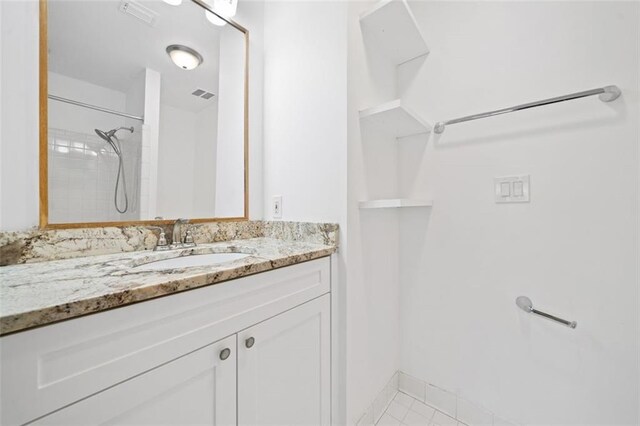 full bathroom featuring vanity, toilet, and tiled shower / bath