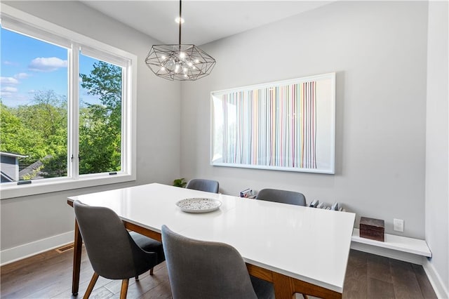 1331 Iverson St NE Unit A, Atlanta, GA 30307 - dining space with a chandelier, baseboards, and wood finished floors