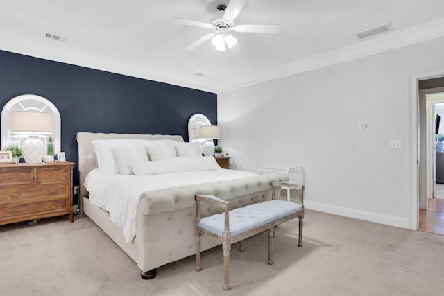 bedroom with ceiling fan, carpet flooring, visible vents, and baseboards