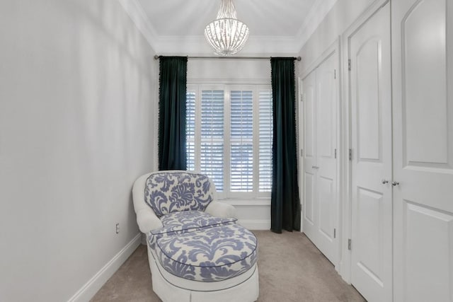 living area featuring a notable chandelier, ornamental molding, baseboards, and light colored carpet