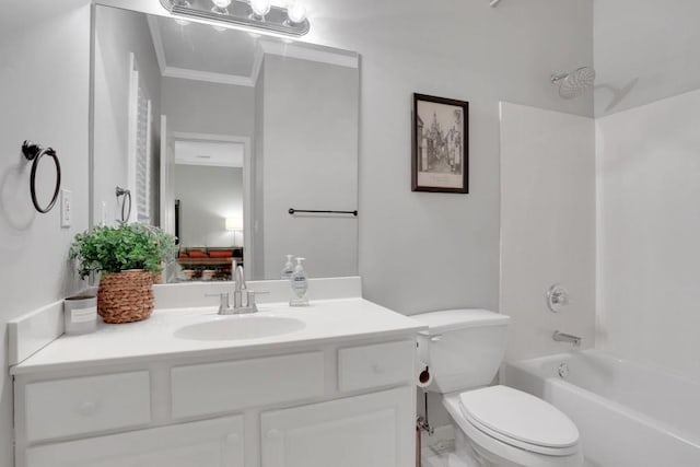 bathroom with toilet, ornamental molding, tub / shower combination, and vanity