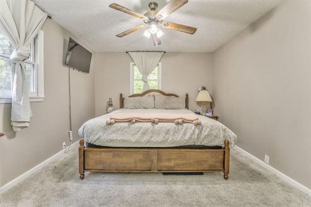111 Sylvan Dr, Calhoun, GA 30701 - bedroom with carpet flooring, baseboards, and a ceiling fan