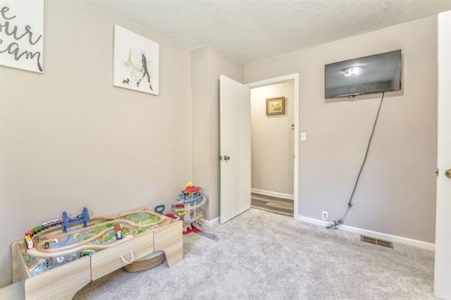 111 Sylvan Dr, Calhoun, GA 30701 - game room with carpet floors and baseboards