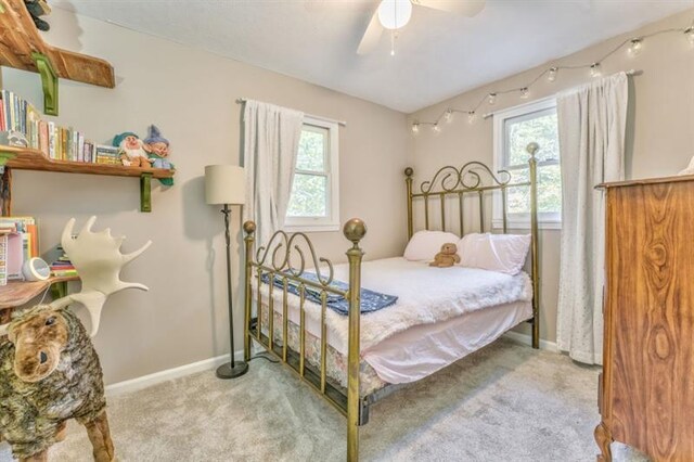 111 Sylvan Dr, Calhoun, GA 30701 - bedroom featuring multiple windows, carpet flooring, baseboards, and ceiling fan