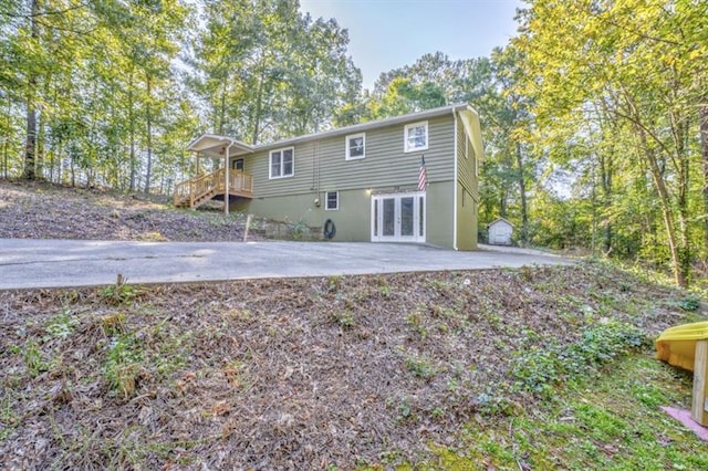 111 Sylvan Dr, Calhoun, GA 30701 - rear view of property featuring french doors and a patio
