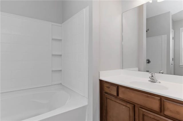 bathroom with vanity and shower / washtub combination