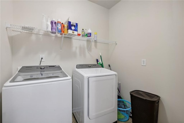 laundry area with independent washer and dryer and laundry area
