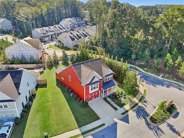 birds eye view of property with a residential view