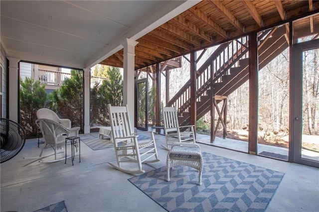 view of patio / terrace featuring stairs