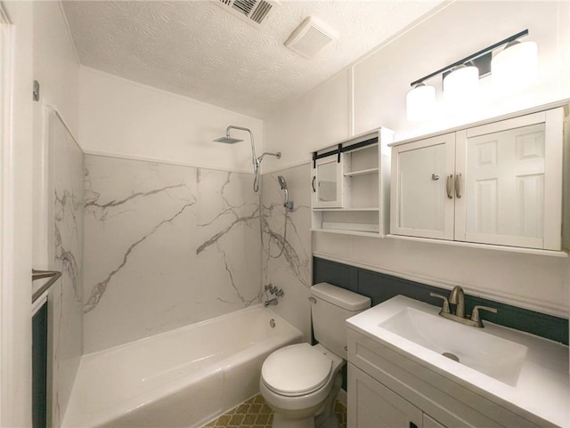 bathroom with a textured ceiling, toilet, shower / washtub combination, and vanity