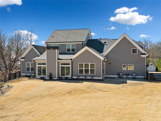 back of property featuring a patio